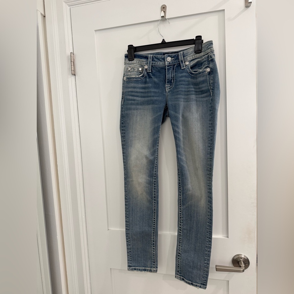 Miss Me light blue denim 8 1/2 inch rise jeans w/ angel wings on back (read)